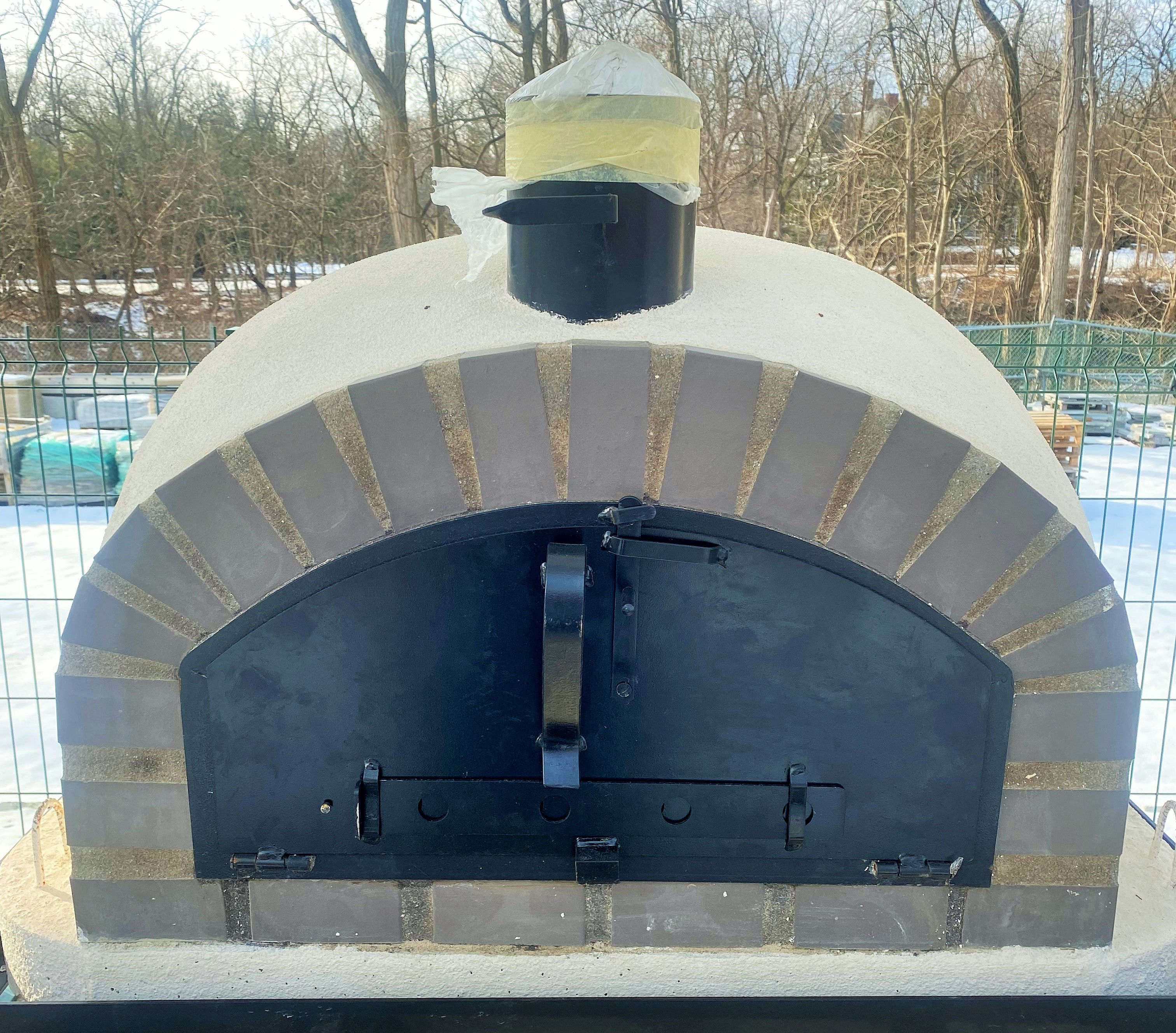 Butterfly Wood Pizza Oven with Black Brick Arc and Stucco finish (100 x 100cm)