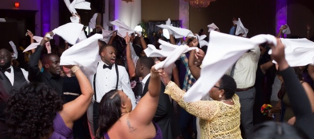 High angle view of DJ performing at a lively event