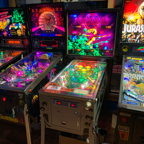 An assortment of restored pinball machines featuring Creature from the Black Lagoon, Stargate, Classic Stern Quicksilver