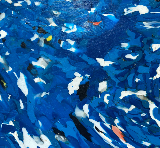 Deep blue pattern with white and light blue specks, mirroring the mysterious depths of the sea.