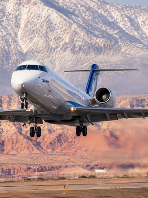 plane taking off of runway