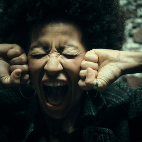 overwhelmed mother experiencing parental rage and emotional overload
