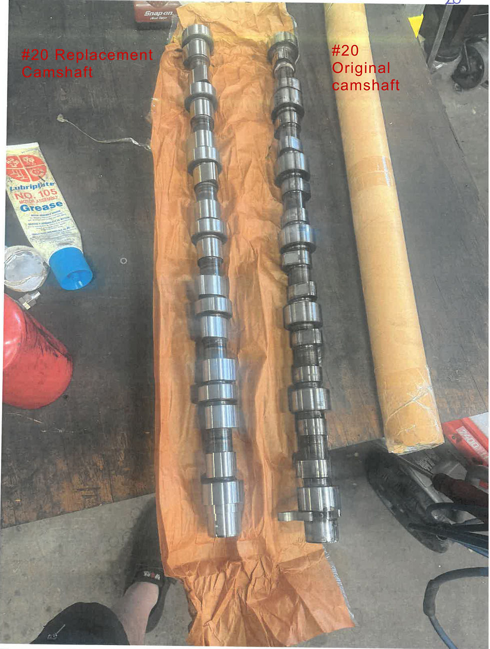 The original camshaft is shown alongside the replacement camshaft.