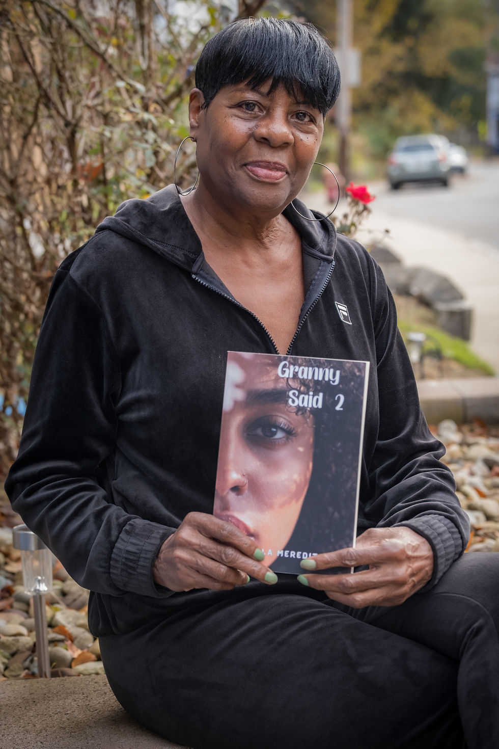 Writer Ella Meredith holds a copy of her new memoir, “Granny Said 2.” Photo by Heather Mull