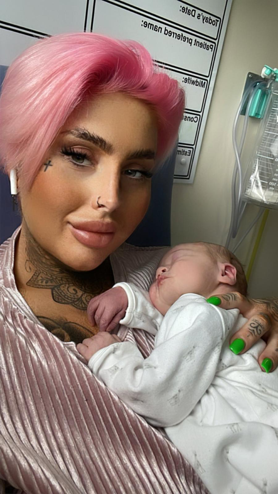 New mum Zowie holding her newborn baby.