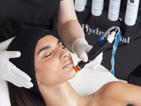 Woman receiving laser hair removal and SkinPen microneedling treatment