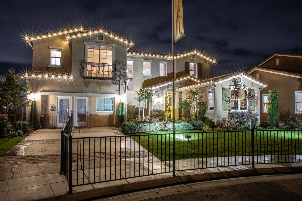 Gated community home with holiday lighting in Bakersfield