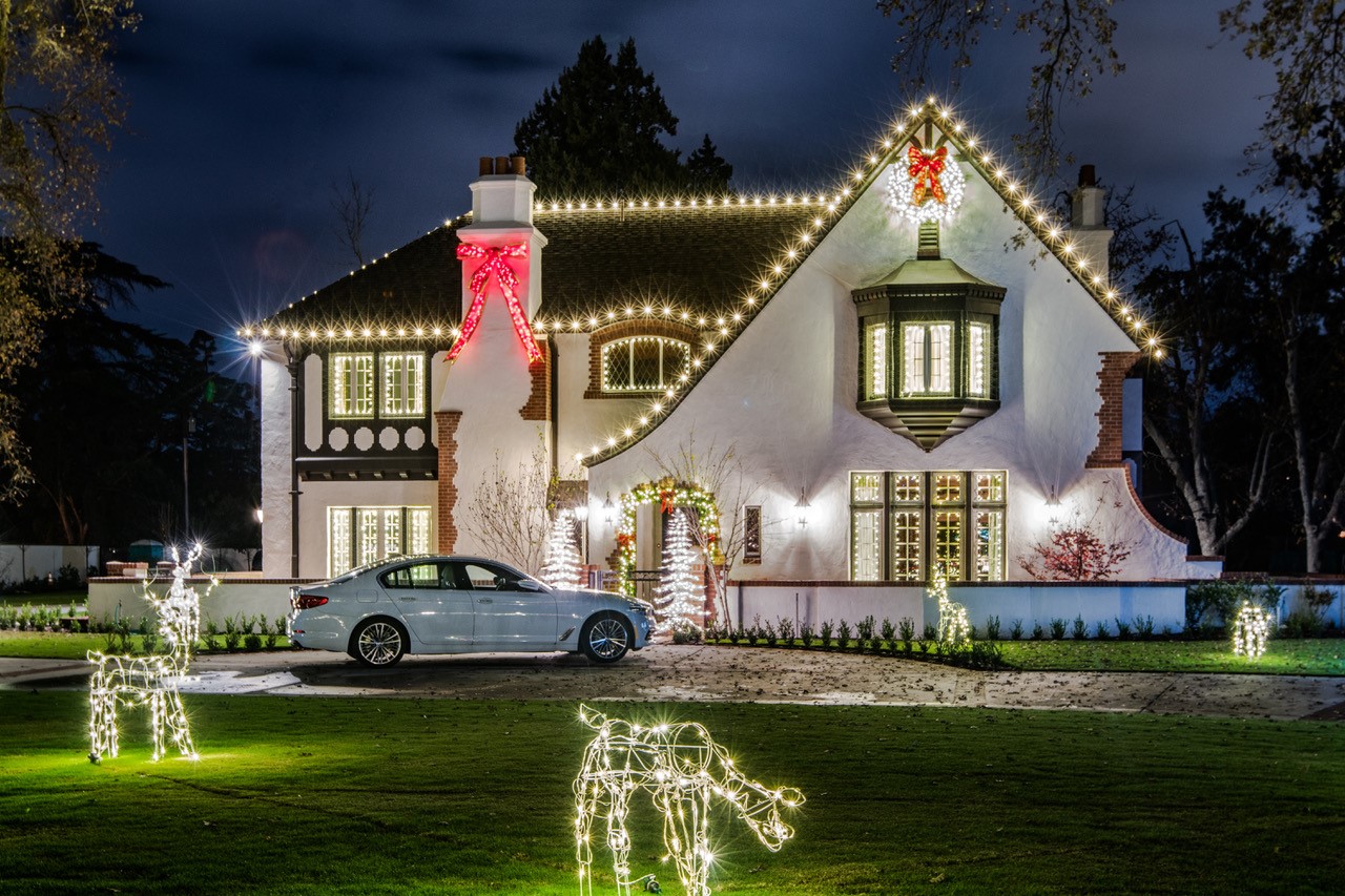 Christmas lights on a Fresno home with lit deer on the lawn