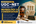 Professional educational thumbnail for UGC–NET Museology & Conservation preparation featuring museum collections, preservation concepts, archival materials, conservation tools, historical artifacts, academic books, structured learning visuals, research environments, examination preparation elements, educational graphics, scholarly analysis themes, and a modern institutional design representing advanced learning and academic excellence in museology and conservation studies.