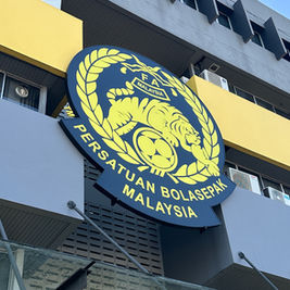 Football Association of Malaysia headquarters facing FIFA sanctions for forgery scandal.