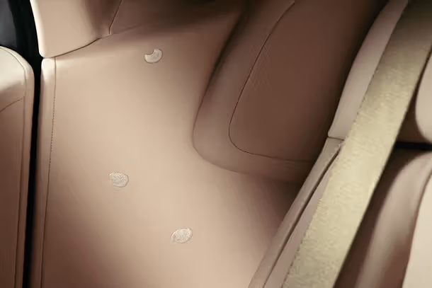 olls-Royce bespoke craftsmanship details in Cherry Blossom Phantom.