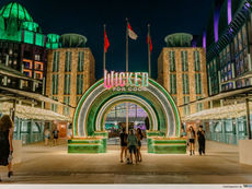 Wicked-themed green archway installation at Sentosa Singapore