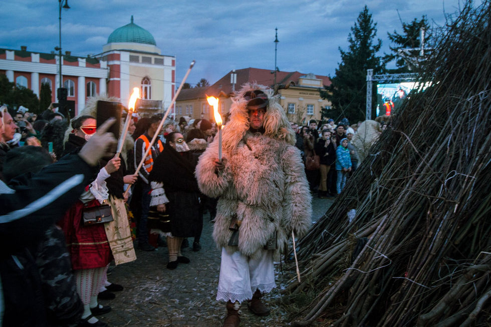 Preparations for lighting the Busójárás bonfire