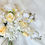 Thumbnail: close up of artificial bouquet of orchids roses and tulips