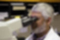 Dr Usmani assessing lesion for diagnosis.jpg