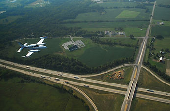 Aircraft over highway.jpg