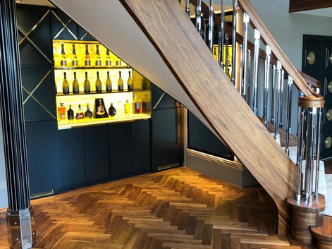 Custom-made twisting staircase with iron spindles and wookden floor