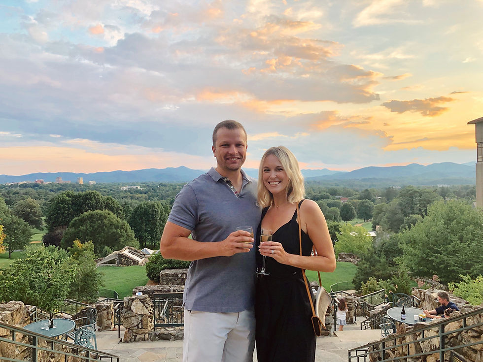 Romantic getaway to Grove Park Inn in Asheville, NC. Cocktails on Sunset Terrace overlooking Blue Ridge Mountains. Asheville travel guide and video diary.