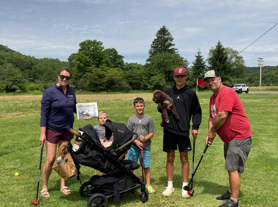 Group playing mini golf on the green course at Bigfoot Park Golf, Ellicottville, NY.”