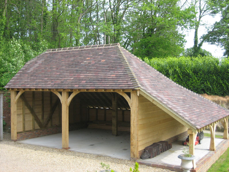 2 bay with barn hip and full hip log store