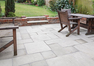New flagstone patio and backyard, outdoor garden patio with furniture, Roman Groundworks, East Sussex