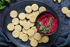 Homemade vegan gluten-free crackers with poppy seeds