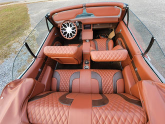 Rear seat and console detail in a custom convertible interior