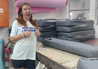 In progress gray school bus bench seat covers ready for reupholstery at Penton's