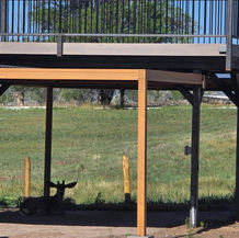 New outdoor play patch construction at Cedaredge Lodge with elevated viewing deck and open recreation space
