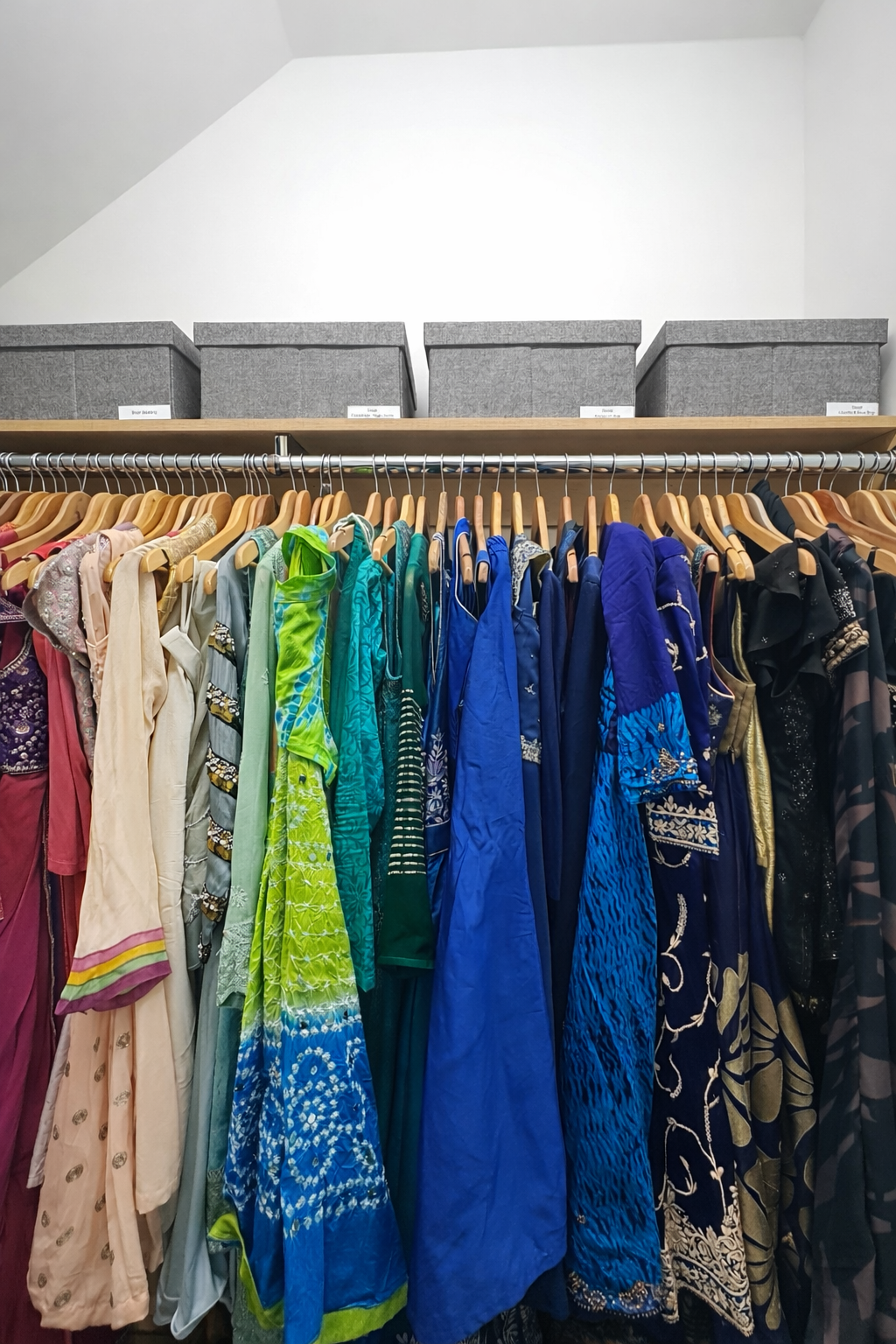 Clothing organized by color and type in a Princeton NJ closet