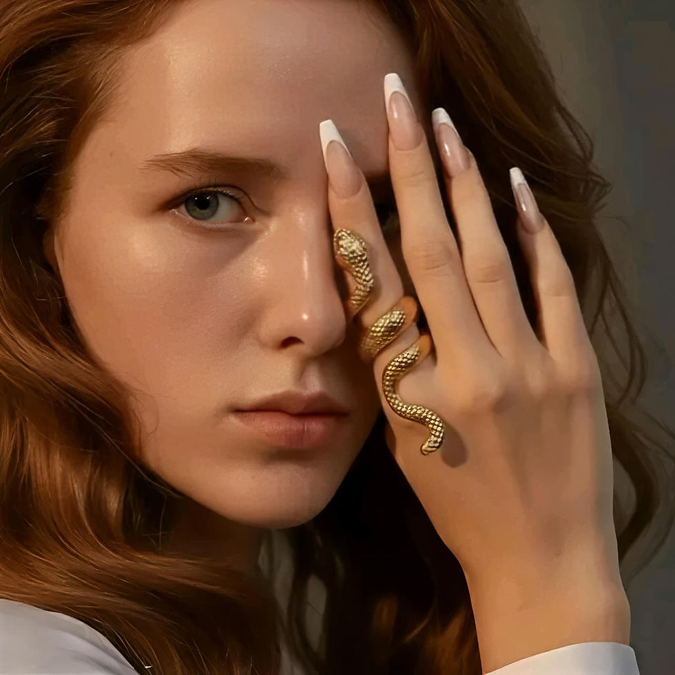Woman displaying a golden snake ring