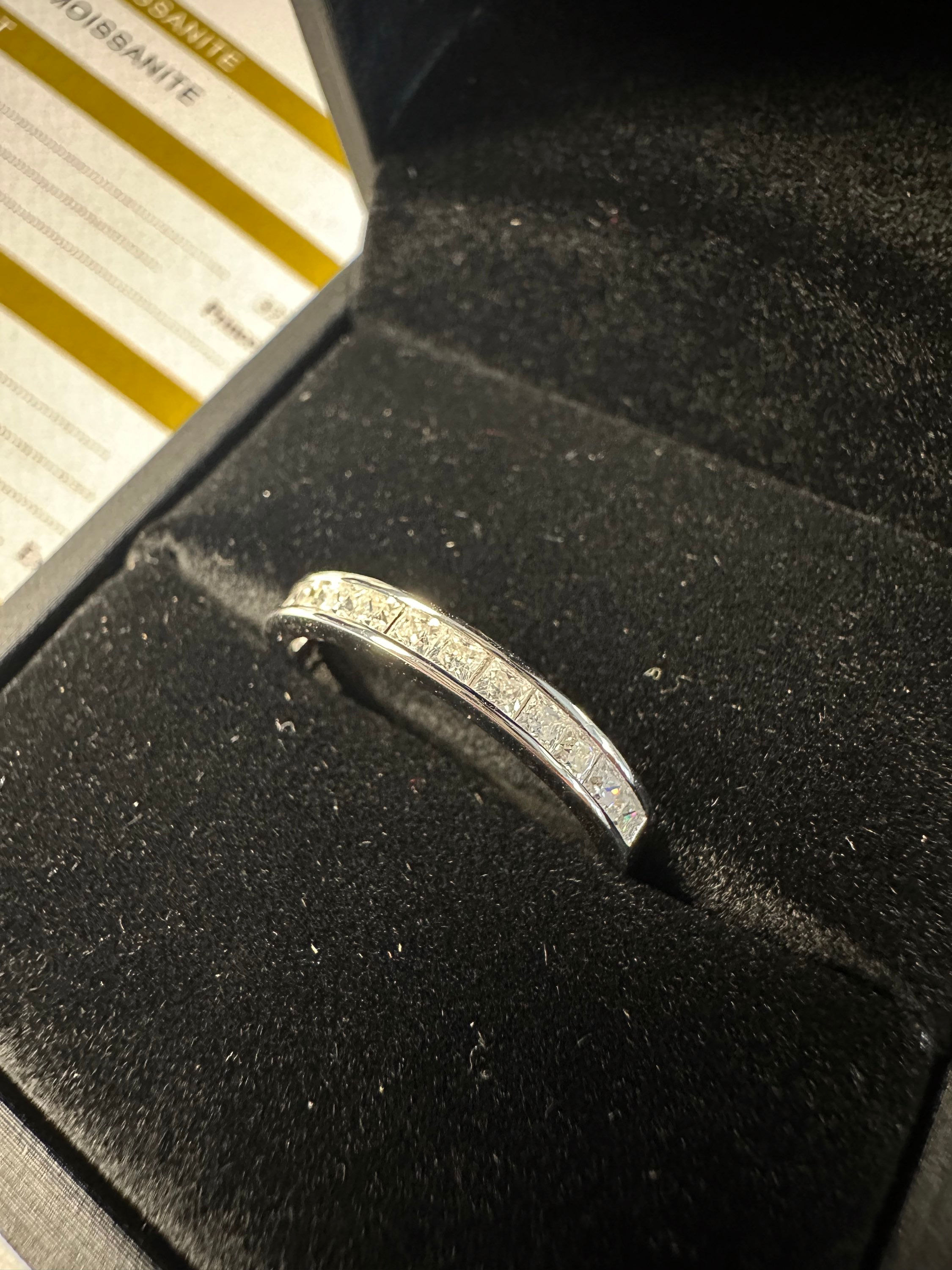 Channel set half round princess cut eternity band 