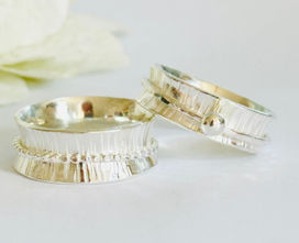 A pair of beautiful silver rings