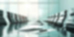 pic of long conference table with chairs