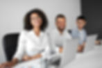 merry-black-female-smiling-looking-camera-while-working-with-multiracial-male-colleagues-w
