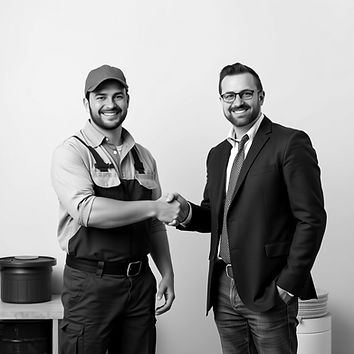 a plumber and a business man shaking hands both smiling .jpg