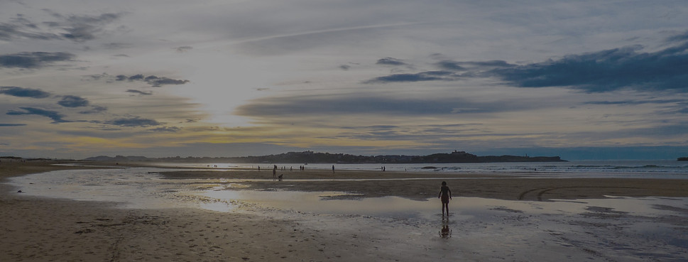 Panoramic image of a sunset on the beach