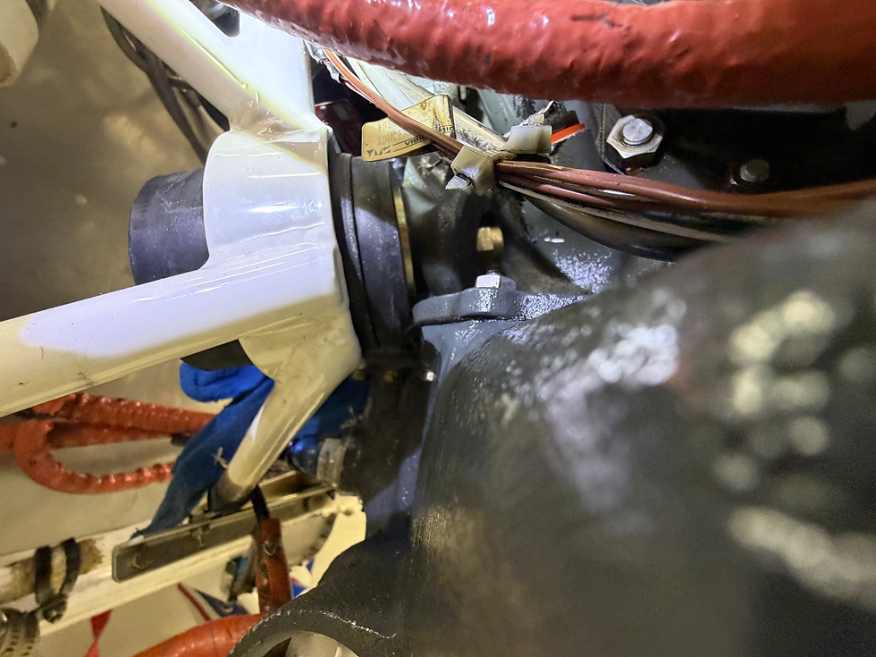 Lower right mount in proper position with the nut started,