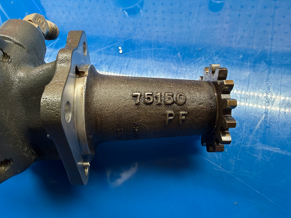 Note the roll pin just above the bottom hole.