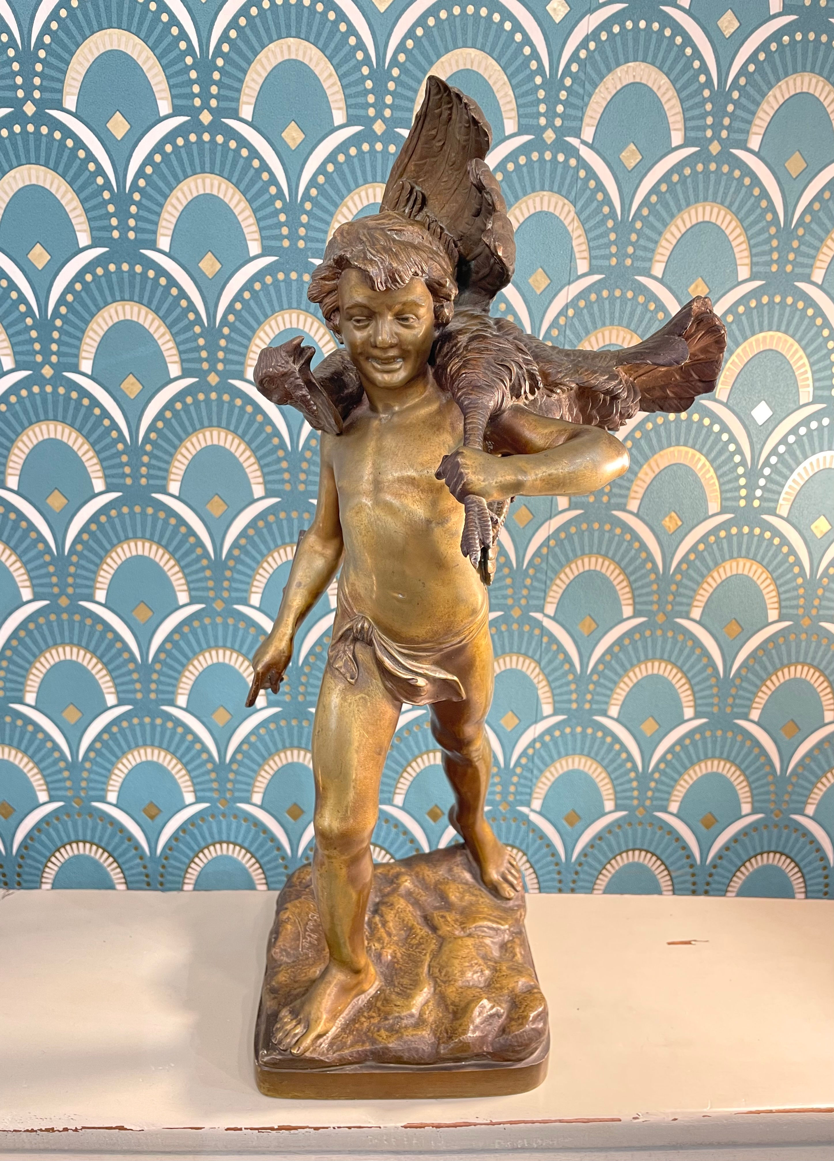 Statue en bronze signée de J Berthet : l'enfant au dindon