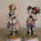 Miniature : Ancienne paire de sujets  en biscuit de porcelaine : les napolitains