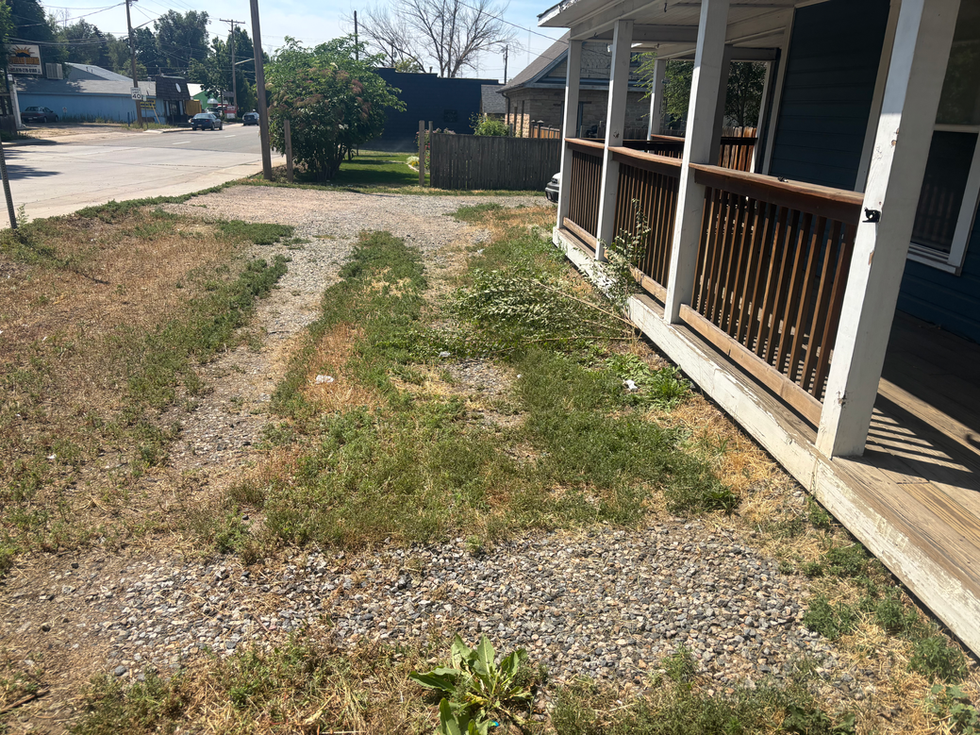 Street side of frount yard leaned up.