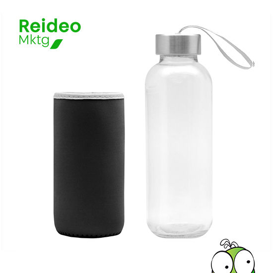 Botella de vidrio. Cuerpo traslúcido. Contiene funda de neopren que permite no calentar la bebida con las manos.