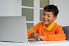 little-boy-watching-films-laptop.jpg