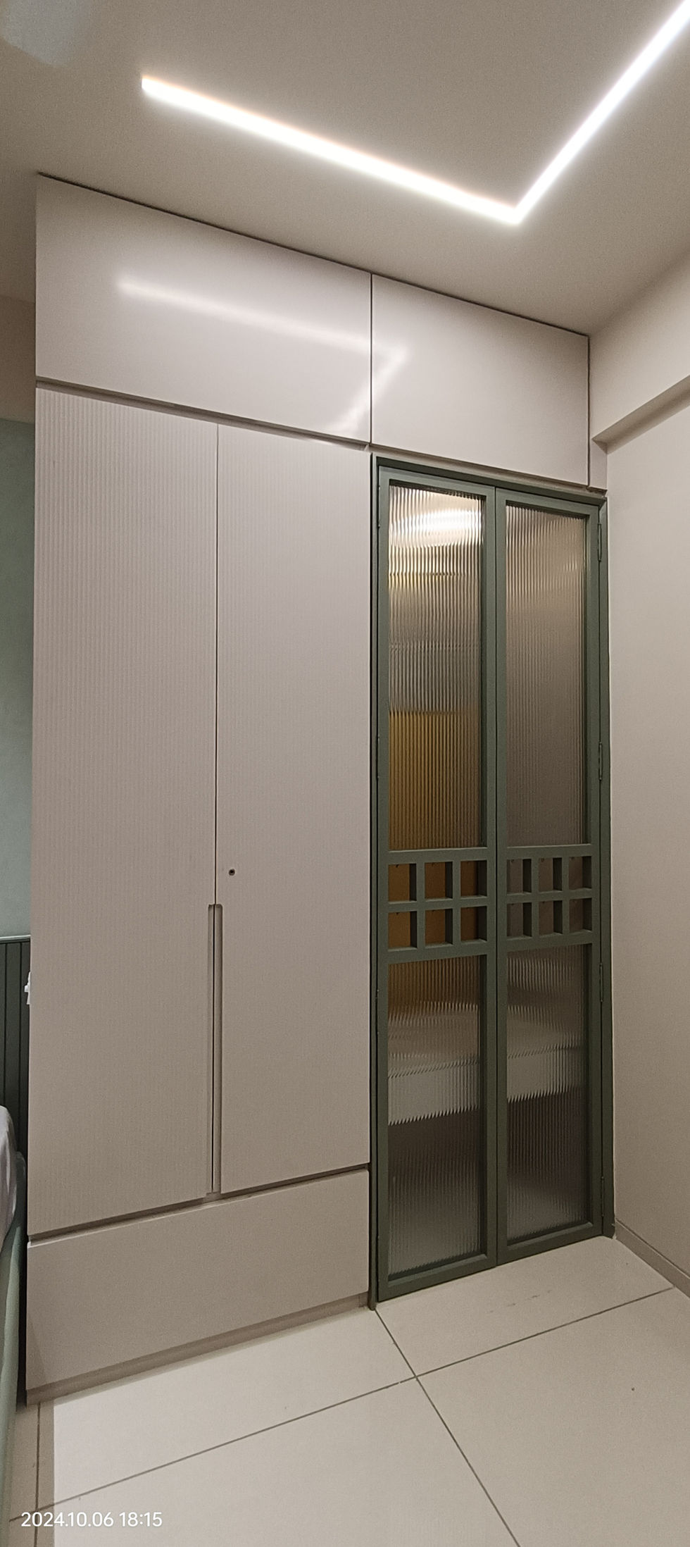 Modern sliding wardrobe with frosted glass panels
