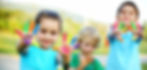 Kids playing with toys, smiling