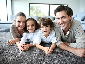 depositphotos_36646273-stock-photo-smiling-family-at-home.jpg