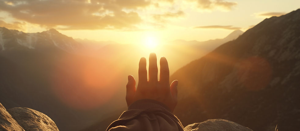 Reaching for the light of a sunrise over a vast mountain landscape, illustrating the freedom and spiritual ascent found by abiding in God's Word.