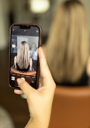 blonde hair salon chair phone