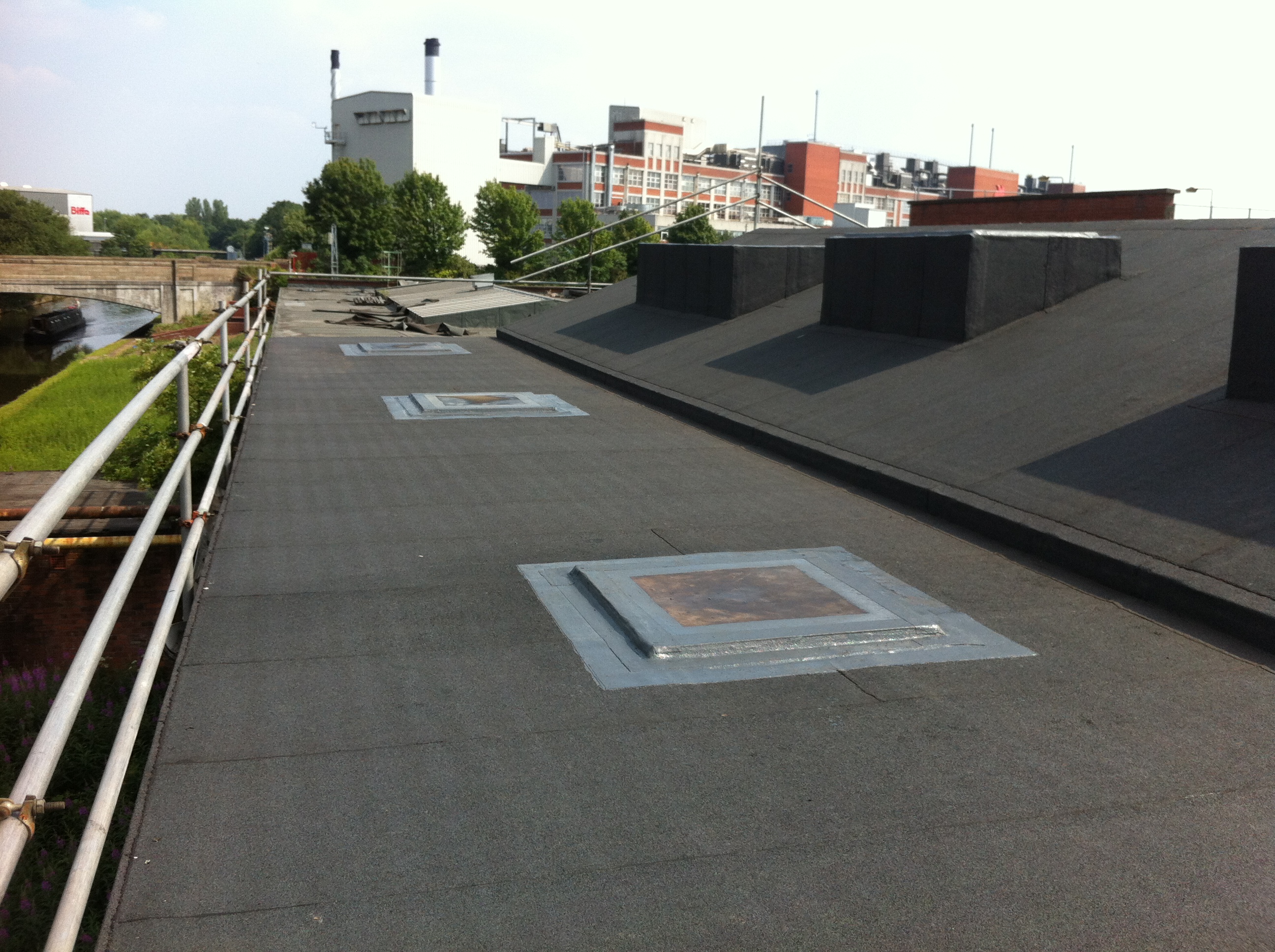Built up flat felt roof complete